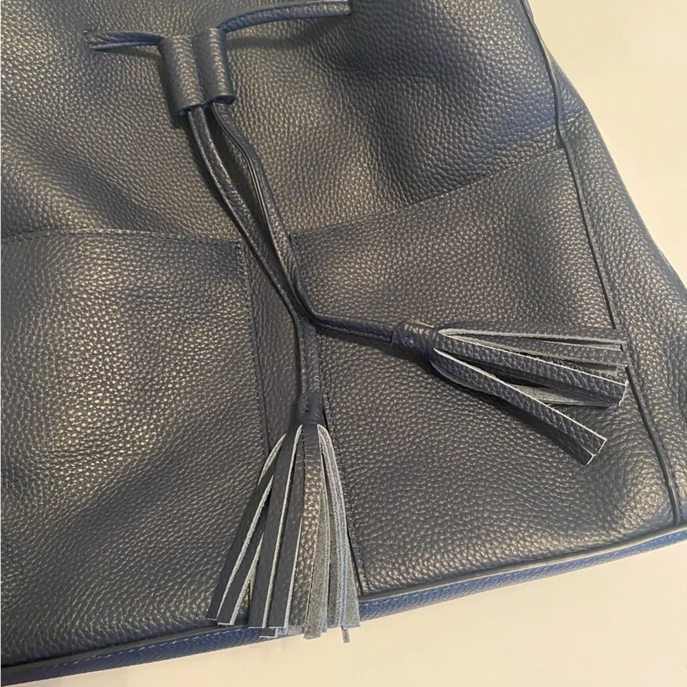 LAGGO || Andrea Tassel Drawstring Hobo Bag Pockets Pebbled Leather Navy‎